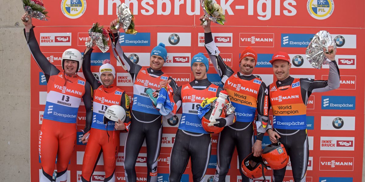 IGLS,AUSTRIA,28.NOV.15 - LUGE - FIL World Cup, artificial track, doubles, men, flower ceremony. Image shows Peter Penz and Georg Fischler (AUT), Toni Eggert and Sascha Benecken (GER) and Tobias Wendl and Tobias Arlt (GER). Photo: GEPA pictures/ Hans Osterauer